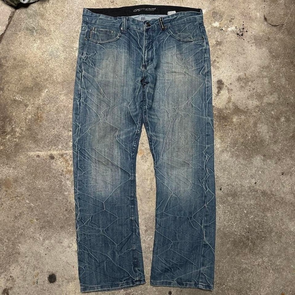 GSL Denim medium-wash faded blue jeans with unique cross-line design Sz36x29